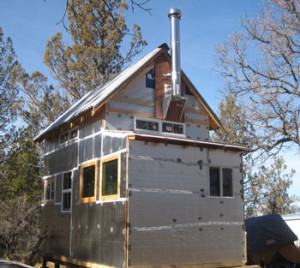 house covered in rigid foam board insulation