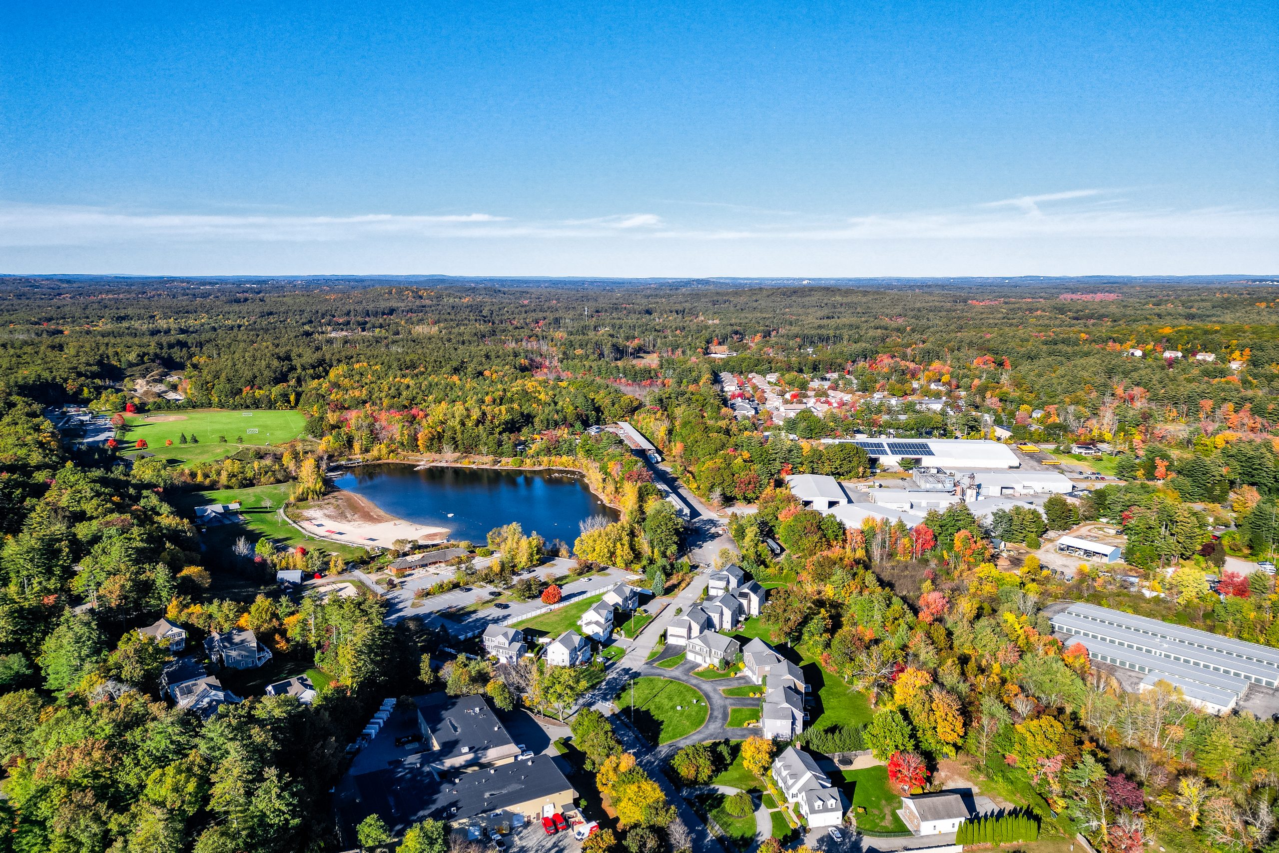 Pest control in Acton, MA view of landscape, houses, pond, public park