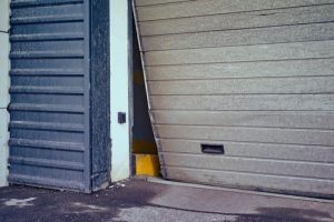 Broken garage door gap gives access for mice rats rodent entry